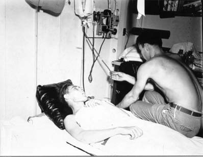 Dr. Johnson Treats Wounded Soldier