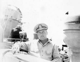 Commander Rollin E. Westholm on the Bridge